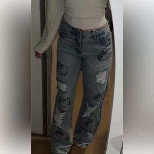 Limited Edition Forever Hello Kitty 90s high-rise distressed jeans